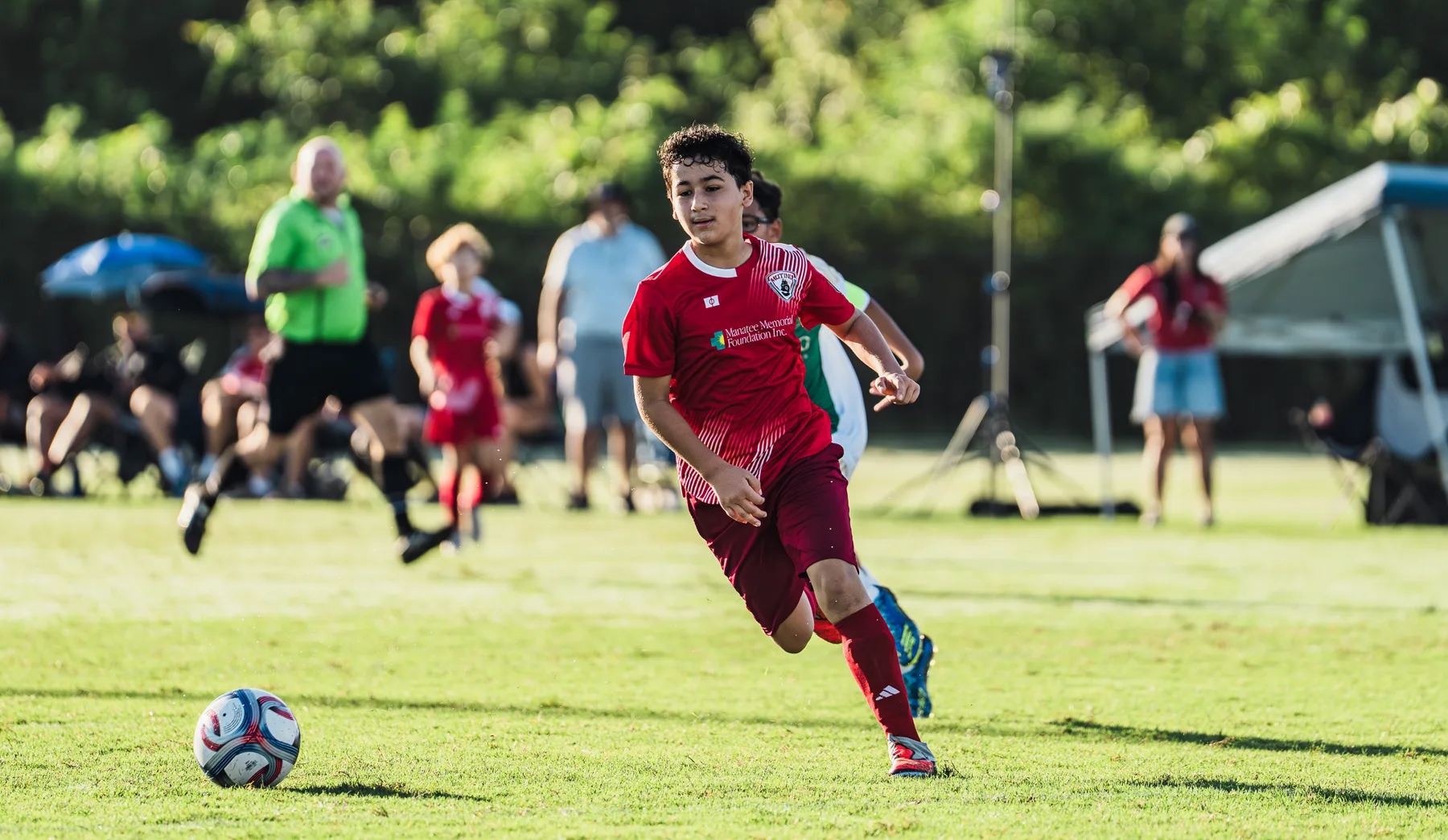 Youth soccer players competing during a Florida tournament